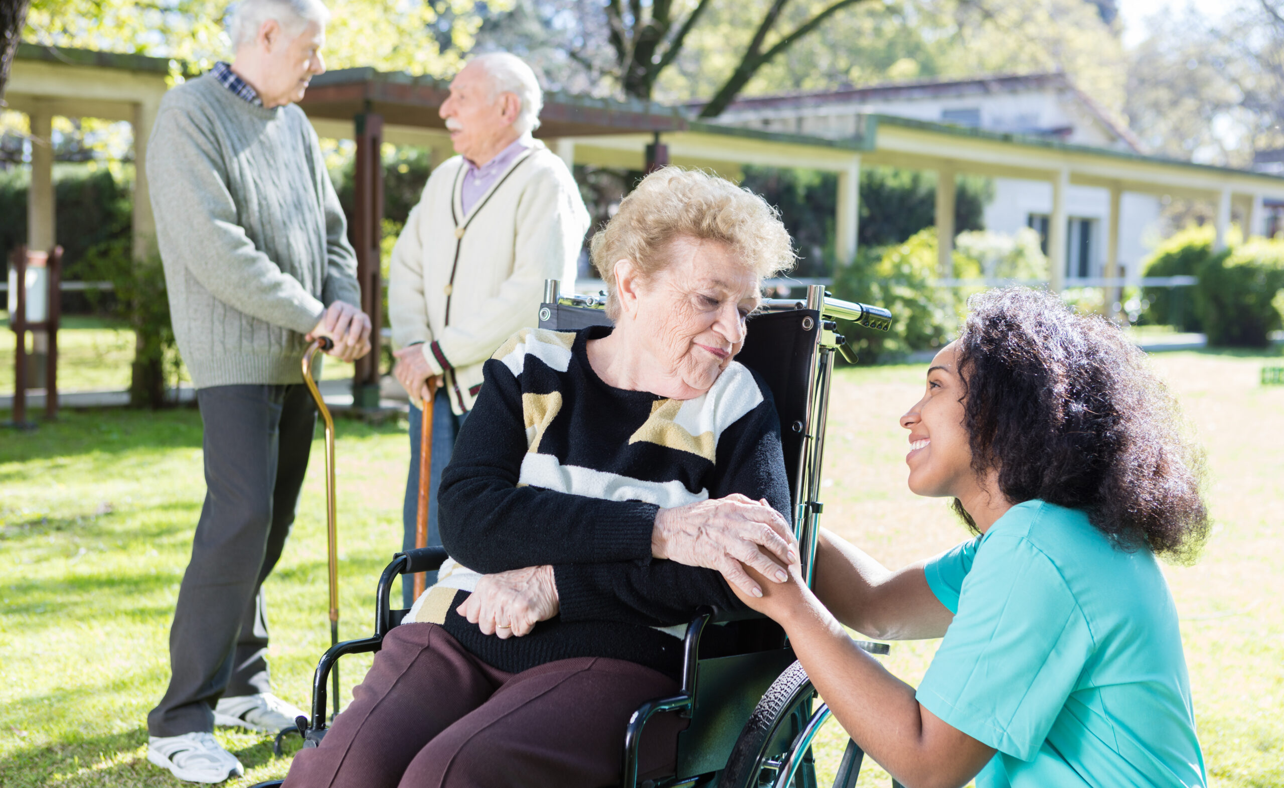 Nurse supporting an older person